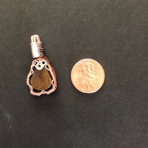 Handmade bone and wire wrapped pendant